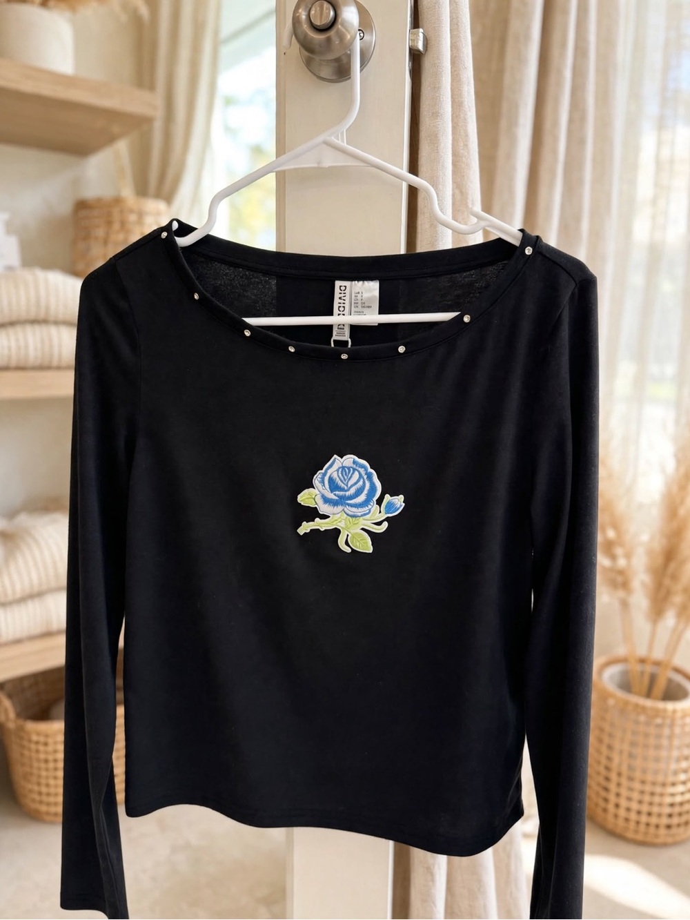 Divided Black Long-Sleeve Top with Blue Rose Patch